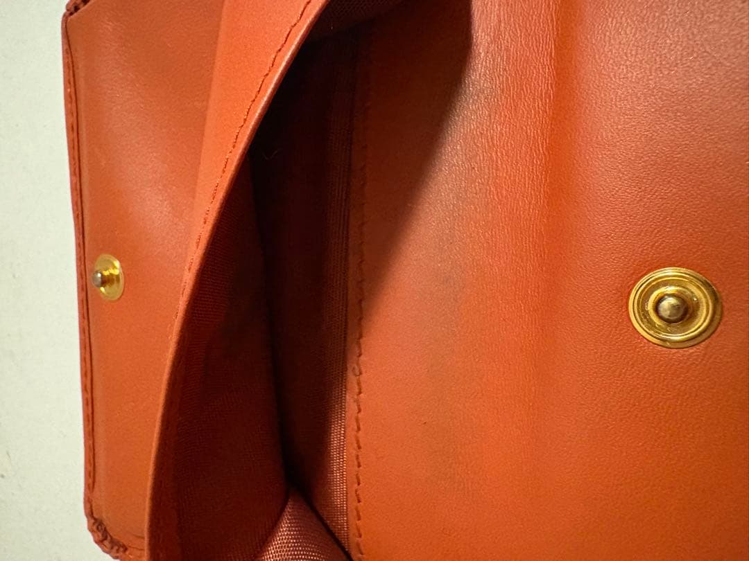 PRADA オレンジ 二つ折り財布