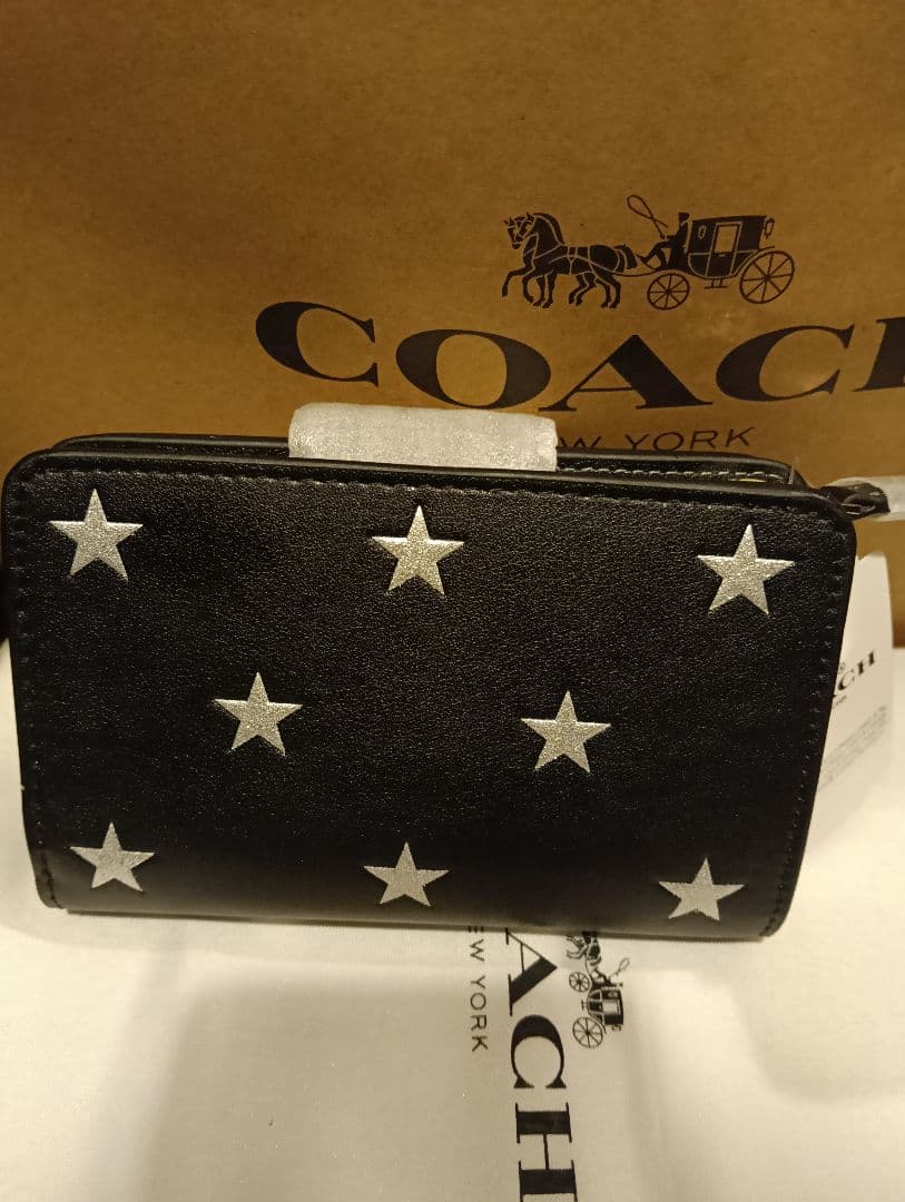 COACH ブラック 星柄 二つ折り財布