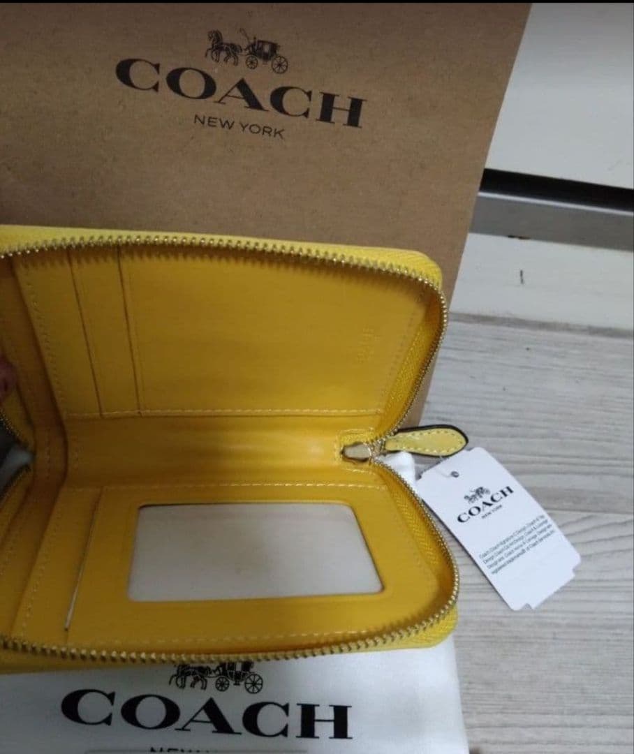 COACH ジャカード コンパクト折り財布 イエロー