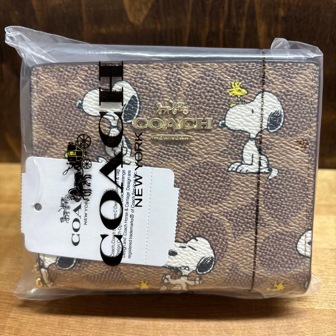 新品 【COACH X PEANUTS】スナップ ウォレット スヌーピー