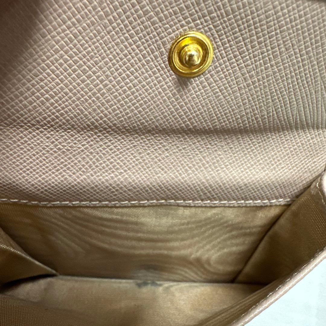a.　PRADA サフィアーノレザー 二つ折り財布 1ML018