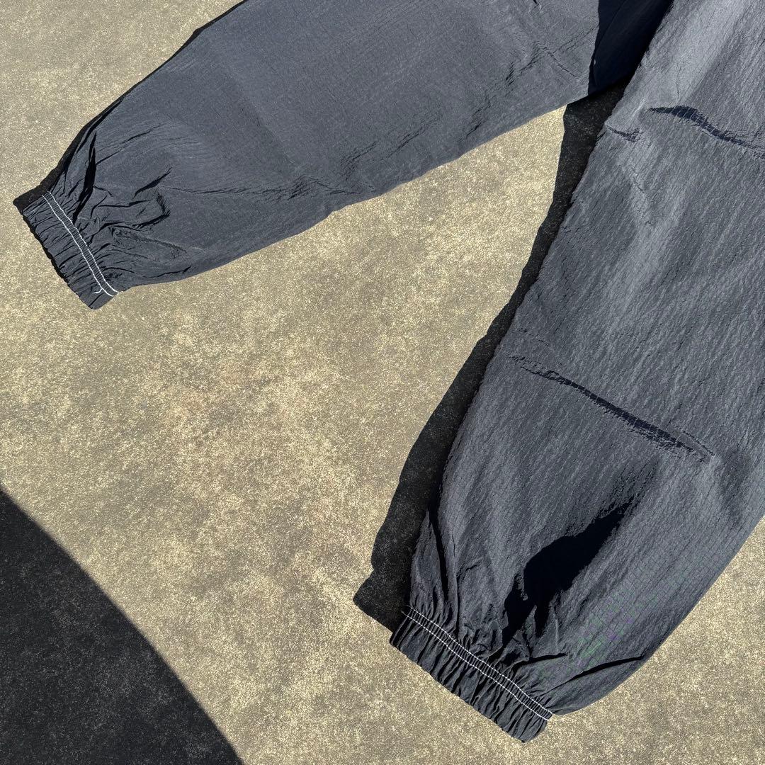 たっくーや　NIKE ナイキ スウッシュステッチ トラックパンツ 黒 M