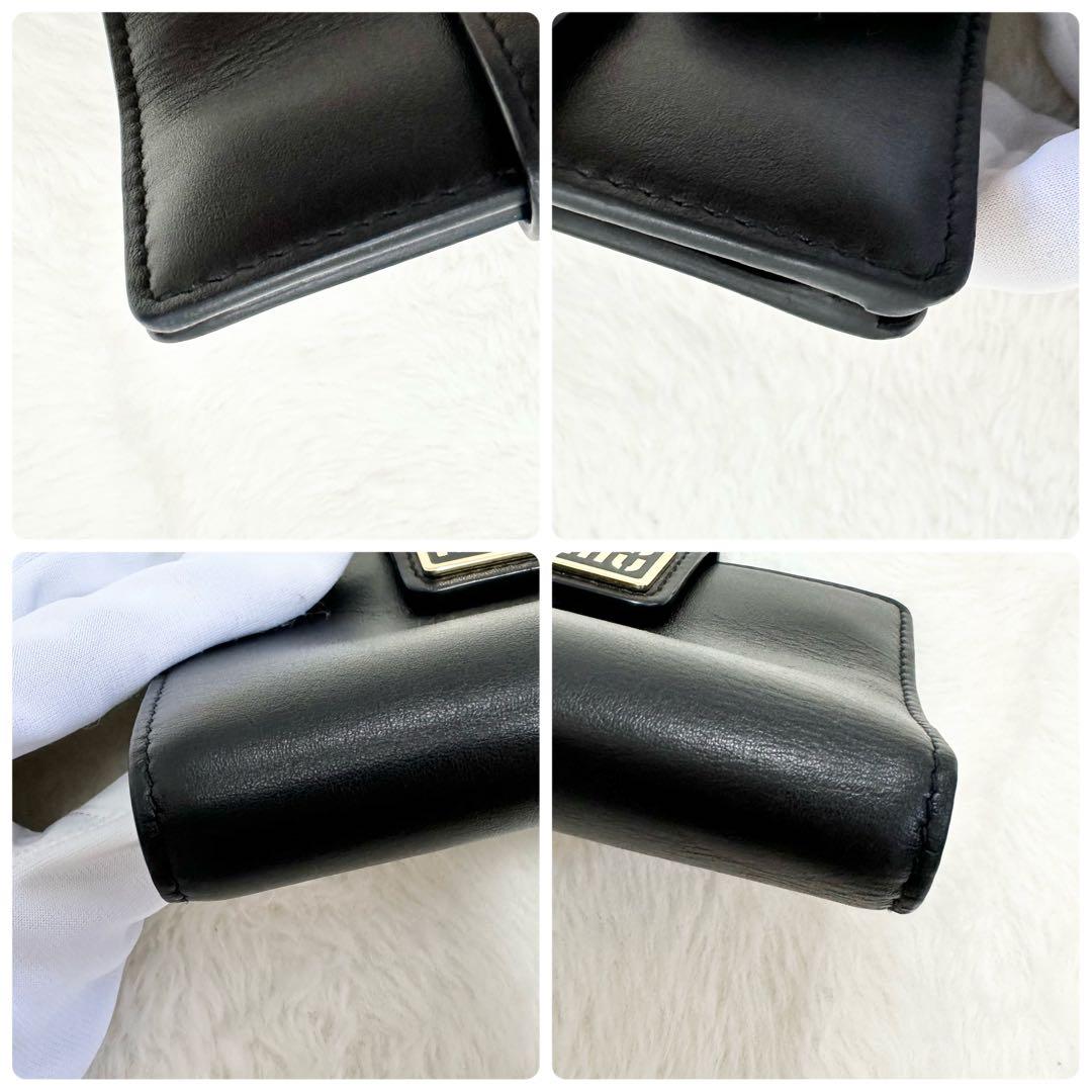 美品✨MIU MIUミュウミュウ 二つ折り財布 黒 金 ロゴ 近年モデル レザー