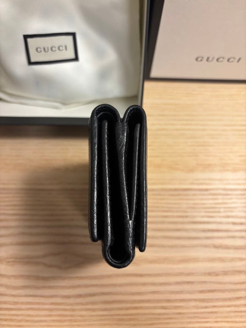 【箱保存袋付き】GUCCI GGマーモント 三つ折り財布 ブラックレザーゴールド