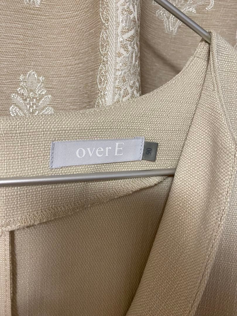 overE ポリニージャンパースカート：エクリュ 90サイズ