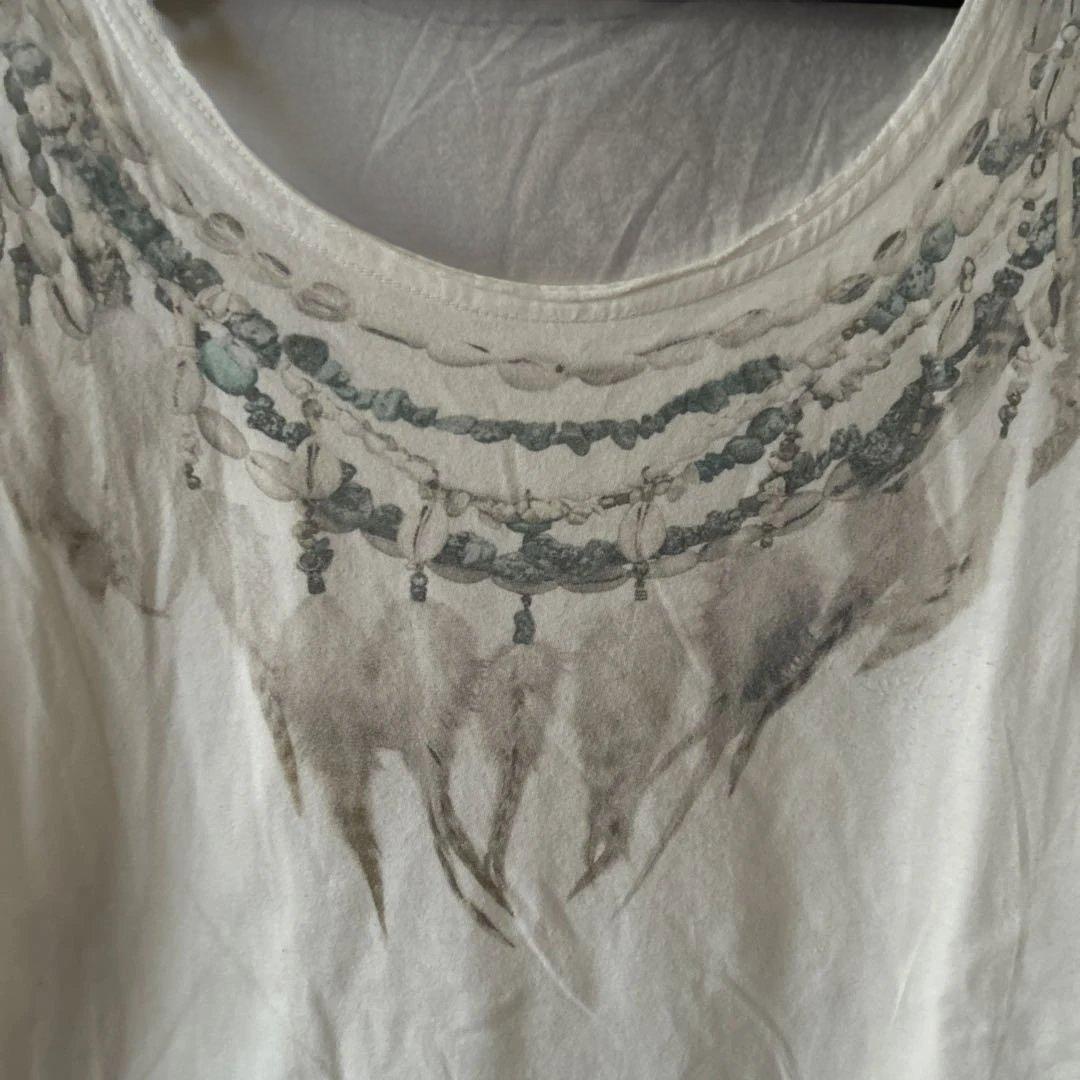 Natural Vintage GoaフェザーデザインTシャツ①