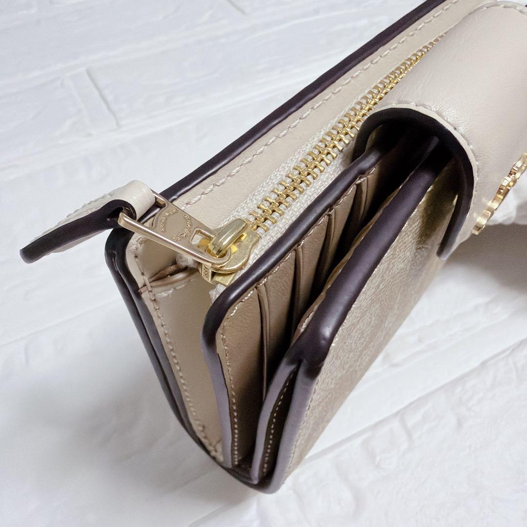 コーチ 二つ折り財布 シグネチャー ベージュ 白 coach