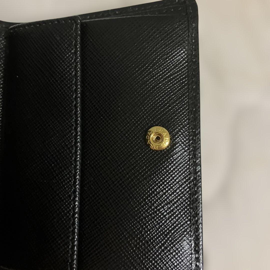 未使用に近い PRADA プラダ 二つ折り財布 サフィアーノレザー