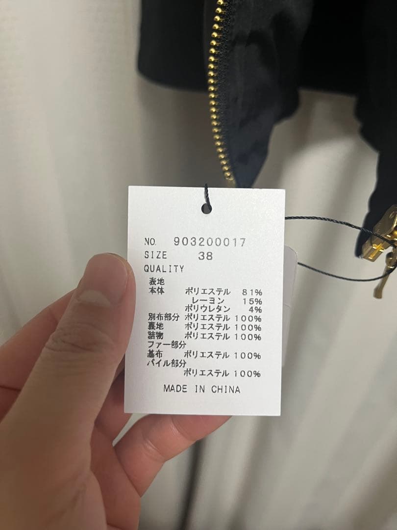 【未使用】フェイクファーフードロングコート（定価32,000円）