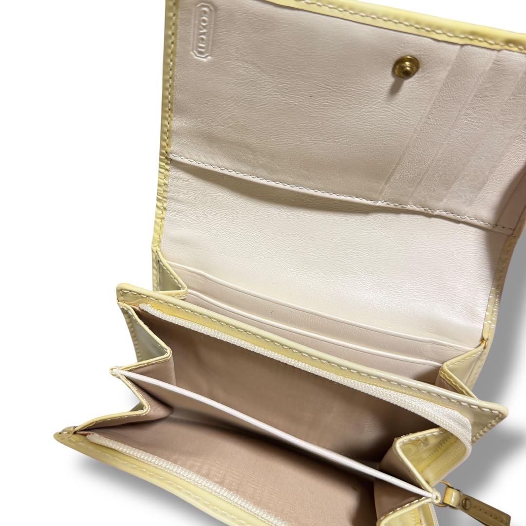COACH コーチ 花柄 二つ折り財布 折財布 シグネチャー イエロー 金運