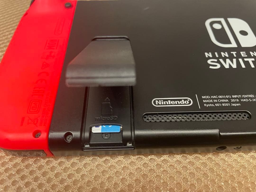 中古Nintendo Switch 本体l充電器・ドック・SDカード・ケース付き