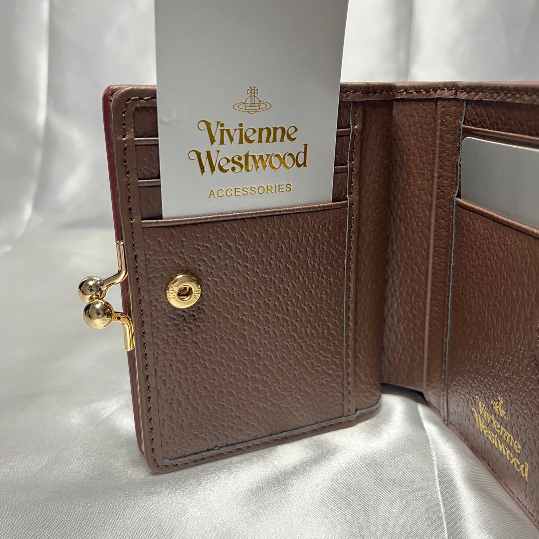 新品Vivienne Westwood 茶 コーヒー 蝶々留め 二つ折り財布